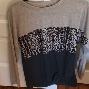 Women’s cotton knit top with animal print detail. Worn 1X. Size small